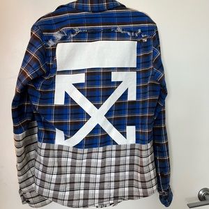 Off white multi color plaid shirt.